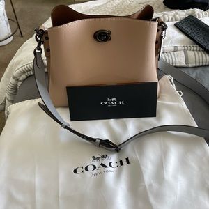 Brand new authentic Coach purse, beautiful taupe color,asking for $295